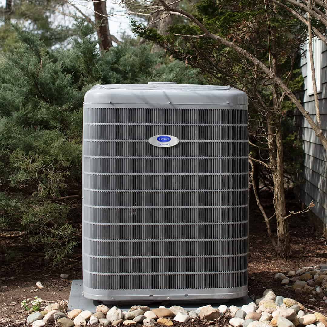 Carrier infinity outdoor AC condenser installed at a Denver home